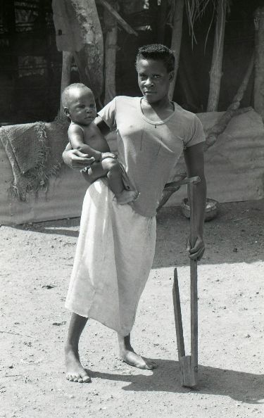 Mother with polio and child - Uganda 1996