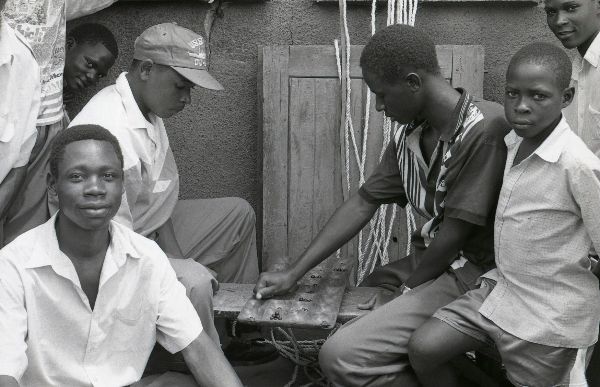 Youths playing 'Mweso' - Mityana - Uganda 1996
